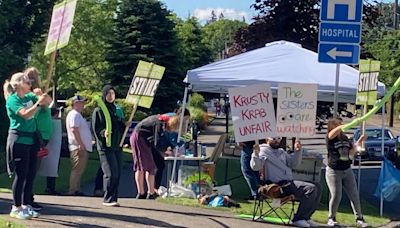 Providence nurses take to the streets in historic strike, as hospitals remain open - Portland Business Journal