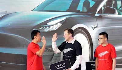 Elon Musk visiting China is a sign Tesla is 'playing nice' with Beijing and its stock will outperform this year, Wedbush says