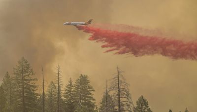 California firefighters make progress as wildfires push devastation and spread smoke across US West