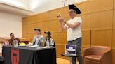 Econ 10 Professors Debate, Juggle Latkes and Hamantaschen at Comical Harvard Hillel Event | News | The Harvard Crimson