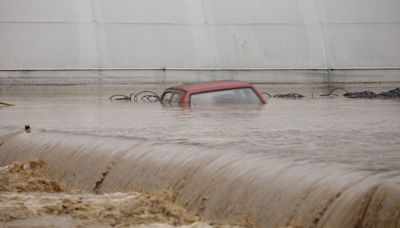 Rainstorms and heavy floods hit large parts of Bosnia, killing at least 14 people