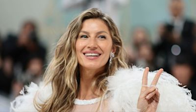 Gisele Bündchen Wore the Ultimate Rich Mom Swimsuit While Sunbathing on a Sand Dune