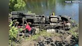 PennDOT truck flips into Schuylkill River