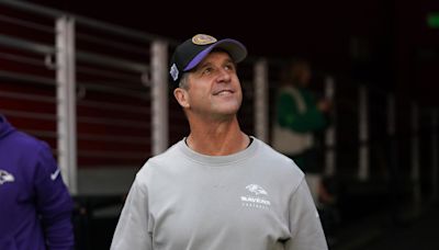 WATCH: John Harbaugh participated in Ravens rookies' wet ball fumble recovery drill