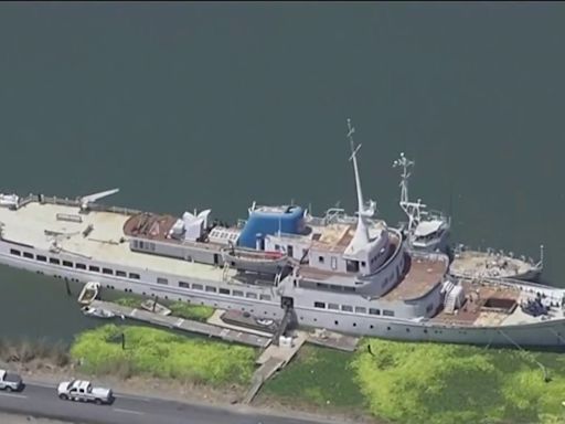 Sinking ship in Delta waterway in San Joaquin County leaking fuel, oil