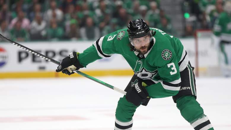 Stars’ Chris Tanev in Walking Boot at Airport: “Fingers Crossed”