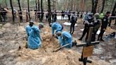 Mass graves unearthed in Ukraine’s Izyum after Russian retreat