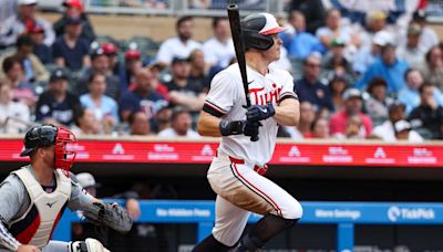 Miranda's 5 hits lead Twins to rain-shortened 12-3 win over Tigers