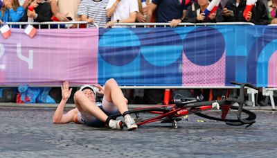 Paris streets littered by bicycle crashes during Olympics triathlon amid wet conditions