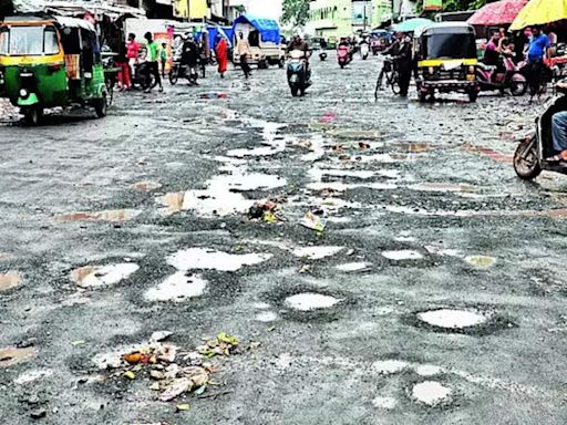 Protests Erupt Over Poor Road Conditions in Surat | Surat News - Times of India