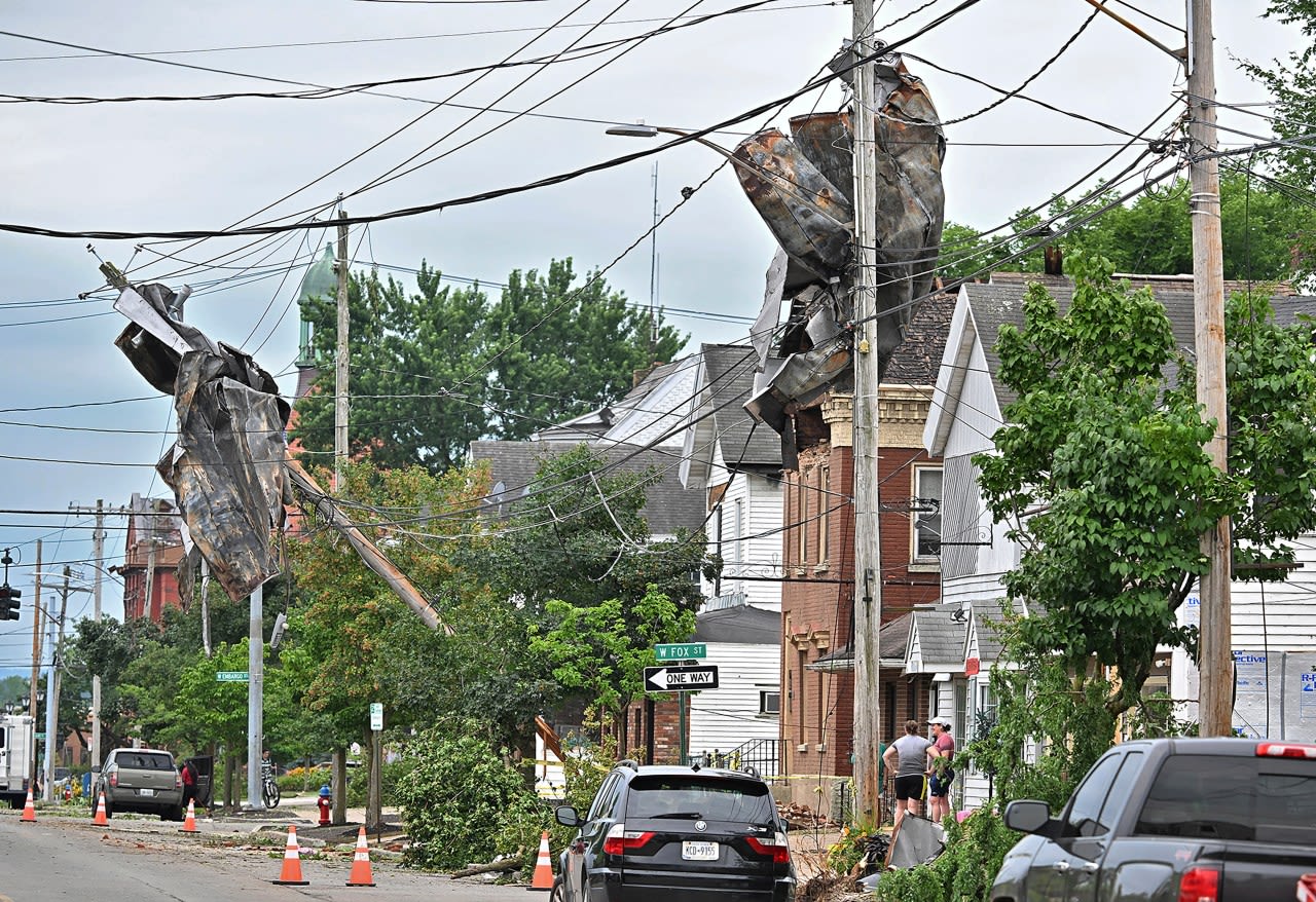 Storms flood the Ozarks and strand drivers in Toronto. New York community is devastated by tornado