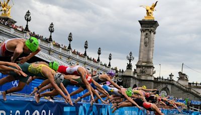 Women triathletes dive into River Seine at Paris Olympics