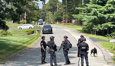 Search ongoing for man accused of pointing gun at mail carrier, ditching car in Tewksbury