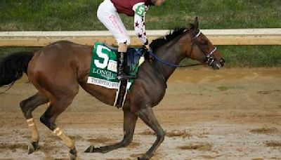 Filly Thorpedo Anna goes wire to wire to dominate soggy 150th Kentucky Oaks at Churchill Downs