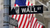 Wall Street sticks near its records as yields slide after jobs report