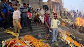 Inside Varanasi, India's holy 'City of Death,' where people hoping to break the Hindu cycle of rebirth go to die