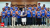 Team India celebrates T20 World Cup win with PM Modi, flaunting custom 'Champions' jerseys - Times of India