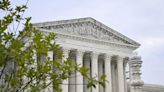 Under ethics pressure, Supreme Court announces it's adopting code of conduct