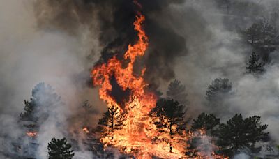 A Colorado man is charged with arson in a wildfire that destroyed 29 homes