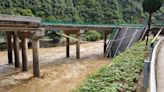 China bridge collapse: at least 11 dead, dozens missing amid heavy storms and flooding