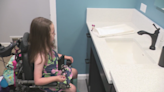 Northland family with young girl in wheelchair wins bathroom remodel giveaway