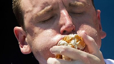 Patrick Bertoletti of Chicago wins his first men’s title at annual Nathan’s hot dog eating contest.