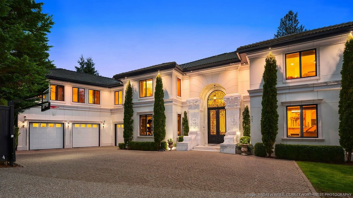 Russell Wilson and Ciara's Bellevue mansion fetches $21.5 million - Puget Sound Business Journal