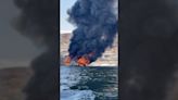 Houseboat with 25 family members aboard bursts into flames and sinks