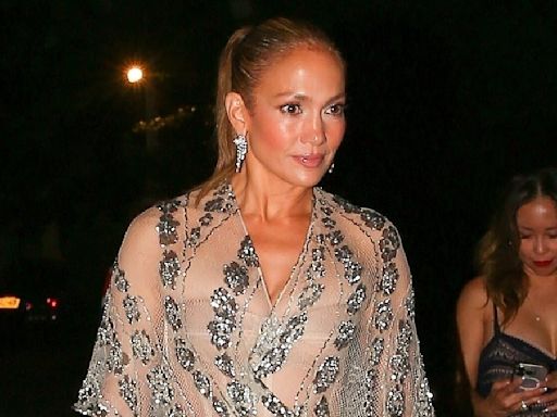 Jennifer Lopez stuns in a nude, sheer dress with floral crystals in NY