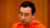 Justice Department reaches settlement with Larry Nassar victims