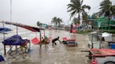 Cyclone floods coastal villages and cuts power in Bangladesh, where 800,000 had evacuated