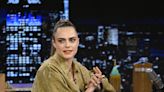 Cara Delevingne Paired a Glamified Khaki Set With Basic White Sneakers