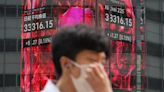 Stock market today: Asian shares sink as central banks crank interest rates still higher