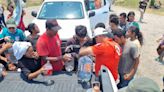 Altas temperaturas en carretera de Oaxaca dobla a miles del Viacrucis del Migrante antes de Tehuantepec