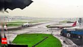 Mumbai airport operations hit by heavy rains, flights delayed | Mumbai News - Times of India