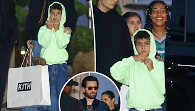 Reign Disick, 9, flips off the paparazzi outside of Nobu with dad Scott, sister Penelope and North West