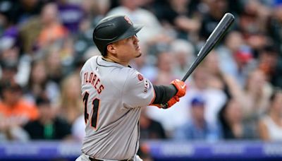 Giants place Flores on 10-day IL with knee injury