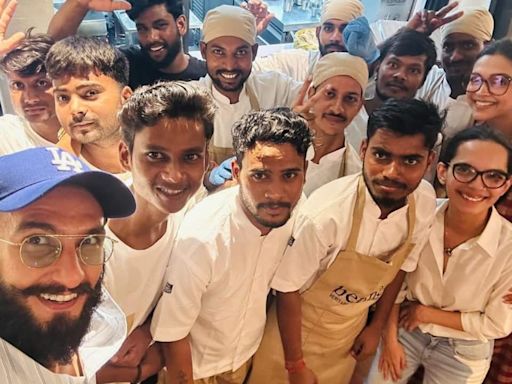 Heavily pregnant Deepika Padukone, hubby Ranveer Singh pose for a happy selfie with restaurant staff