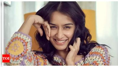 Shraddha Kapoor breaks walnuts with phone; fans say 'Woh Stree hai, kuch bhi kar sakti hai' | - Times of India