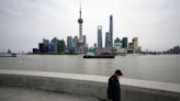 Shanghai lets financial firms resume work as COVID curb ease - sources