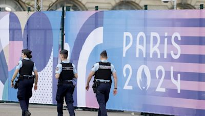Central Paris locks down for Olympics as athletes arrive