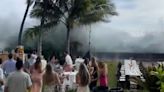 Huge waves crash into wedding reception in Hawaii after tropical storm