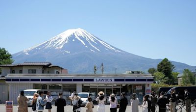 Japan blocks iconic Mt Fuji view to deter tourists