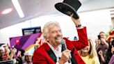 Billionaire Sir Richard Branson Surprises Entire Delta Flight with a Free Cruise on Virgin Voyages’ Newest Ship