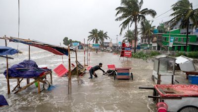 Cyclone floods coastal villages and cuts power in Bangladesh, where 800,000 had evacuated