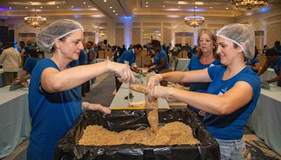 Breakers leaders join volunteers to pack thousands of meals for county food bank