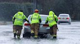 Atmospheric river forces water rescues and road closures in Southern California as a stronger storm looms for the weekend