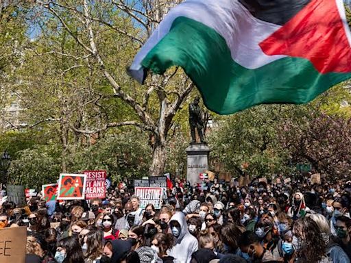 NYU students and staff descend on Washington Square Park demanding 'total academic boycott of Israel' a day after 100 were arrested