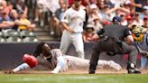 Elly races home to score from second -- on a pickoff?