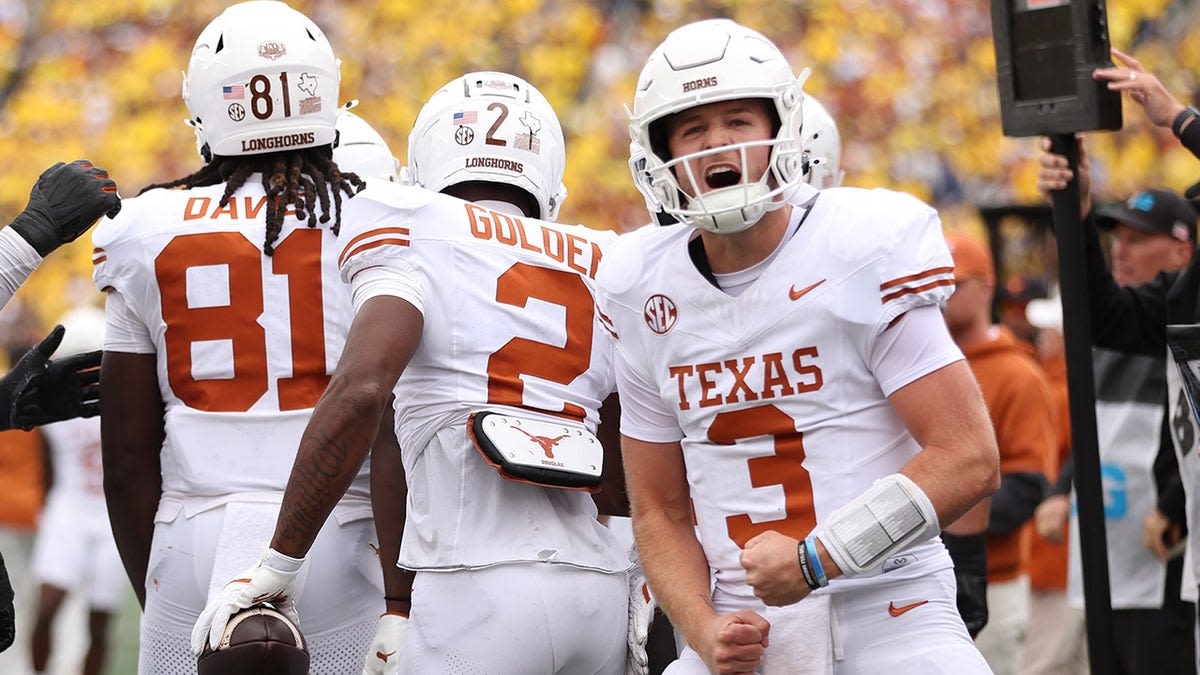 Arch Manning converts 2 touchdowns in 3 plays after coming off the bench for injured Texas starter